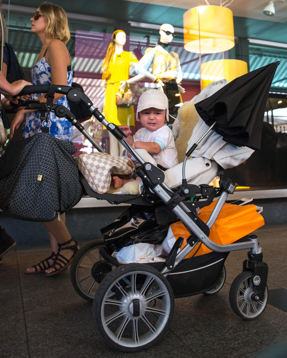 Fashionable, not comfortable. Locarno, Switzerland, just over the border from Italy. This stroller is definitely a structure!