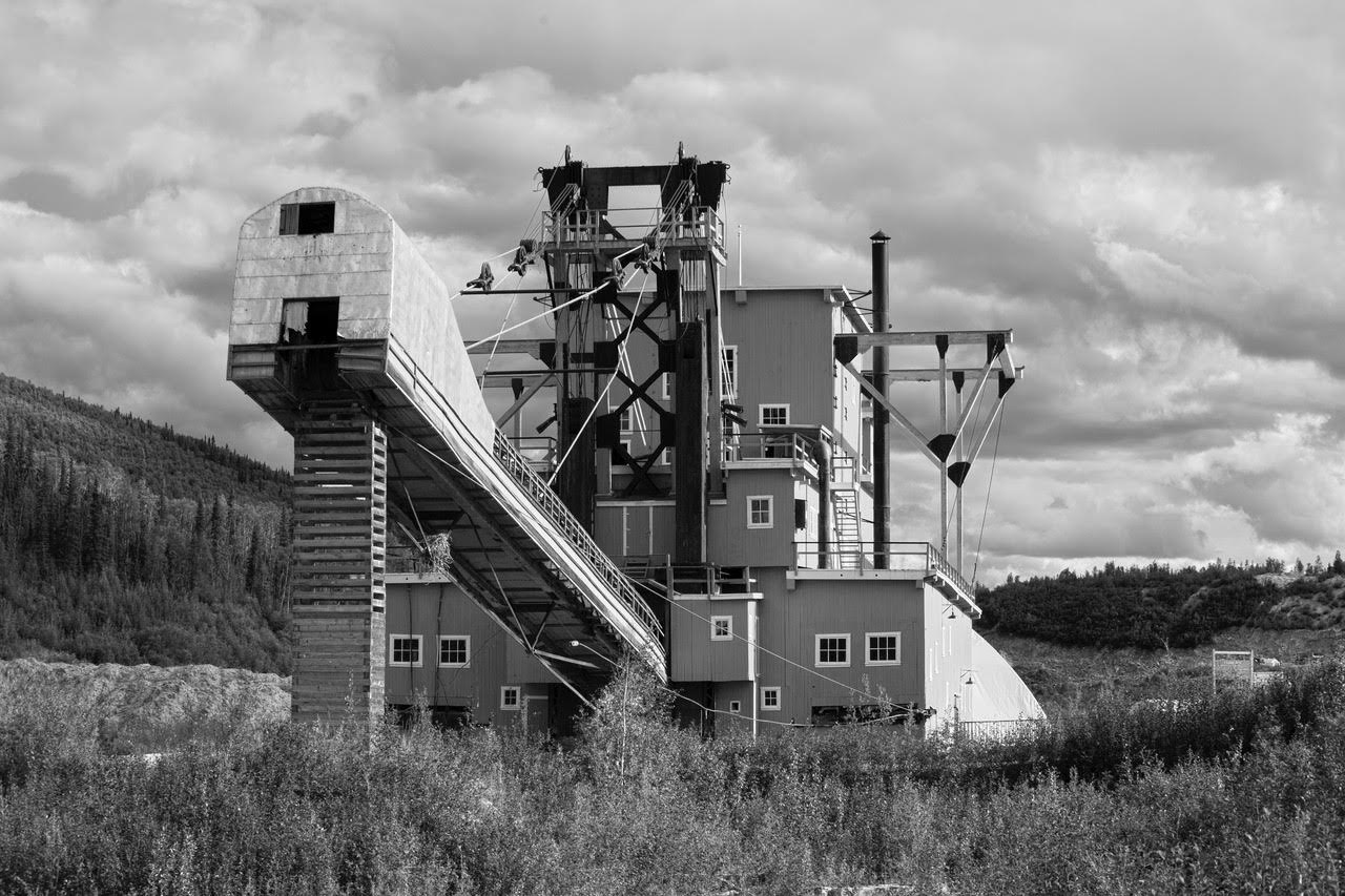 Gold Dredge #4, the largest extant dredge in the Yukon, near Dawson City. This is a museum, not currently functional. These things actually floated down the creeks, dredging millions of dollars of gold out of the stream beds and making a major mess where they passed.